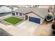 This single-story home offers a manicured front lawn, ample parking and boat parking at 502 N 110Th St, Mesa, AZ 85207