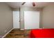 Bedroom featuring wood floors, closet and ceiling fan at 502 N 110Th St, Mesa, AZ 85207