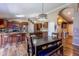 Kitchen and dining area featuring granite countertops, stainless appliances, and tile backsplash at 502 N 110Th St, Mesa, AZ 85207