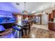Open concept kitchen with stainless appliances, wood cabinetry, and beautiful aquarium at 502 N 110Th St, Mesa, AZ 85207