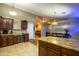 Stylish kitchen featuring an island with granite countertops, stainless appliances, and ample cabinetry at 502 N 110Th St, Mesa, AZ 85207