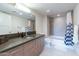 Modern bathroom features sleek vanity, toilet, and shower-tub combo at 535 W Thomas Rd # 211, Phoenix, AZ 85013