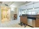 Modern kitchen with stainless steel appliances, stylish cabinets, and an adjacent bathroom, designed for functionality at 535 W Thomas Rd # 211, Phoenix, AZ 85013