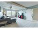 Bright living room with large windows, neutral colors, and stylish furniture, creating a cozy and inviting atmosphere at 535 W Thomas Rd # 211, Phoenix, AZ 85013
