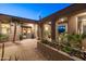 Beautiful courtyard with water feature, palm trees, brick pavers, and access to the residence at 59 W Cypress St, Phoenix, AZ 85003
