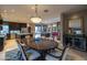 Elegant dining area with dark wood table, seating for six, and seamless access to outdoor living space at 59 W Cypress St, Phoenix, AZ 85003
