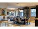 Formal dining area with elegant chandelier and views into the living room at 59 W Cypress St, Phoenix, AZ 85003