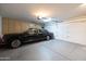 Spacious garage featuring ample storage, with a classic black vehicle at 59 W Cypress St, Phoenix, AZ 85003