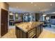 Open concept kitchen with a large island and views of the living and dining areas at 59 W Cypress St, Phoenix, AZ 85003