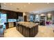 Spacious open concept kitchen with a large island and stainless steel appliances at 59 W Cypress St, Phoenix, AZ 85003