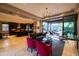 Spacious living room seamlessly connecting to a modern kitchen and outdoor pool area at 59 W Cypress St, Phoenix, AZ 85003