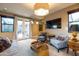 Relaxing living area with stylish furniture, large windows, and an open layout at 59 W Cypress St, Phoenix, AZ 85003