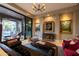 Elegant living room with stylish furnishings, artwork, and a seamless indoor-outdoor flow to the pool area at 59 W Cypress St, Phoenix, AZ 85003
