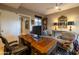 Bright home office with a wooden desk, seating, and elegant decor, offering a productive workspace at 59 W Cypress St, Phoenix, AZ 85003