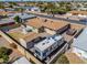 Aerial shot of a backyard with a shed, camper, hot tub, and covered patio at 6319 E Duncan St, Mesa, AZ 85205