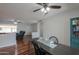 The dining room shows an open floorplan, hardwood floors, and a connection to living spaces at 6319 E Duncan St, Mesa, AZ 85205