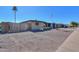 Charming single-story home with a brick facade, gravel yard, and a tidy front garden at 6319 E Duncan St, Mesa, AZ 85205