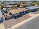 Aerial view of a single-story brick home with desert landscaping and a driveway at 6319 E Duncan St, Mesa, AZ 85205