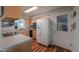 Well-lit kitchen featuring modern appliances and ample counter space for meal prep at 6319 E Duncan St, Mesa, AZ 85205