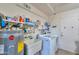 Functional laundry area featuring a washer and dryer, utility sink, and plenty of room at 6319 E Duncan St, Mesa, AZ 85205