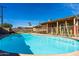 Sparkling pool with a safety fence offers a refreshing escape in a private backyard oasis at 8519 E Rancho Vista Dr, Scottsdale, AZ 85251