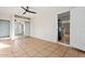 Multi-use room featuring neutral colors and a ceiling fan at 9245 S 4Th Ave, Phoenix, AZ 85041