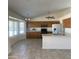 Spacious kitchen featuring wood cabinets and stainless steel appliances at 9318 E El Paso St, Mesa, AZ 85207