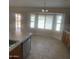 Bright kitchen nook with tile floors and plantation shutters at 9318 E El Paso St, Mesa, AZ 85207