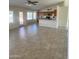 Open floor plan with kitchen bar and counter offers great flow, with modern finishes at 9318 E El Paso St, Mesa, AZ 85207