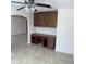 A built-in desk and cabinet create a functional and stylish office space in this home at 9318 E El Paso St, Mesa, AZ 85207