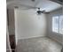 This neutral room has bright, natural light shining through plantation shutters at 9318 E El Paso St, Mesa, AZ 85207