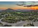 Panoramic aerial view showcasing the house and its scenic desert surroundings with mountain views at 10020 E Relic Rock Rd # 18, Scottsdale, AZ 85262