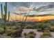 Desert view featuring sunset, saguaros, and golf course at 10020 E Relic Rock Rd # 18, Scottsdale, AZ 85262