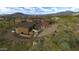 Stunning home exterior with desert landscaping and a circular driveway at 10020 E Relic Rock Rd # 18, Scottsdale, AZ 85262