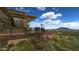 Exterior view of home featuring desert landscaping, terrace, and mountain views at 10020 E Relic Rock Rd # 18, Scottsdale, AZ 85262