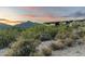 Stunning desert home with captivating mountain views and vibrant sunset skies at 10020 E Relic Rock Rd # 18, Scottsdale, AZ 85262