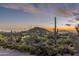 Picturesque desert landscape featuring iconic cacti and mountain views at twilight at 10020 E Relic Rock Rd # 18, Scottsdale, AZ 85262