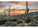 Vibrant desert landscape featuring majestic saguaros and panoramic sunset at 10020 E Relic Rock Rd # 18, Scottsdale, AZ 85262