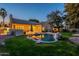 Backyard at dusk featuring pool, patio, and view of the home's rear elevation at 10431 N 55Th Pl, Paradise Valley, AZ 85253