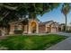 Charming single-Gathering home with a well-manicured lawn and a spacious three-car garage at 10431 N 55Th Pl, Paradise Valley, AZ 85253