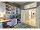 Bright office with stylish built-ins, a cozy desk space, and a peek into the hall at 10431 N 55Th Pl, Paradise Valley, AZ 85253