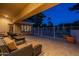 Covered patio area with comfortable seating, perfect for outdoor relaxation and entertaining at 10431 N 55Th Pl, Paradise Valley, AZ 85253