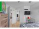 Bedroom featuring an ensuite bathroom and plenty of natural light at 16402 N 31St St # 228, Phoenix, AZ 85032