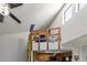 Loft area above kitchen offering extra space with a basketball hoop, natural light, and a view of the room at 16402 N 31St St # 228, Phoenix, AZ 85032