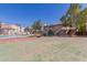 Community pool and basketball court with well maintained landscaping surrounded by several residential buildings at 16402 N 31St St # 228, Phoenix, AZ 85032
