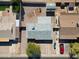 Bird's eye view of backyard with shed, patio, fire pit, and mature landscaping adjacent to the home at 1757 W Argon St, Mesa, AZ 85201