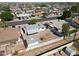 Aerial view of a backyard featuring a gravel landscape and a quaint garden area, enclosed by a white fence at 1757 W Argon St, Mesa, AZ 85201