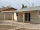 Relaxing back patio with sliding glass doors offers seamless indoor-outdoor living and a tranquil outdoor space at 1757 W Argon St, Mesa, AZ 85201