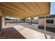Spacious covered patio and low-maintenance backyard, perfect for outdoor entertaining and relaxation at 1757 W Argon St, Mesa, AZ 85201