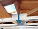 Exposed ceiling beams inside the garage; showcasing the structure and potential for customization at 1757 W Argon St, Mesa, AZ 85201